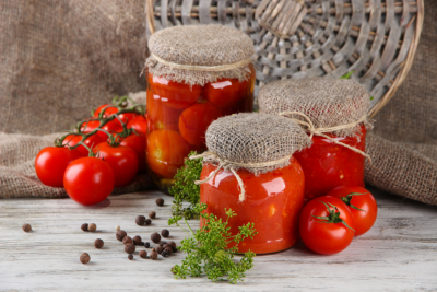 Fresh tomatoes and canned tomatoes.